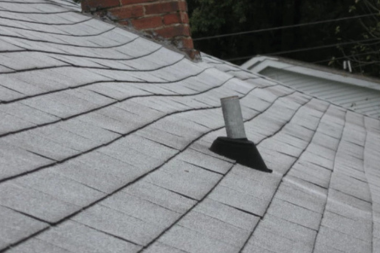 sagging roof line on shingle roofing in Greater Lansing