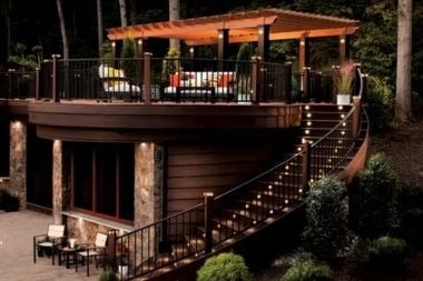 Trex outdoor lighting on stairs and post caps in Greater Lansing