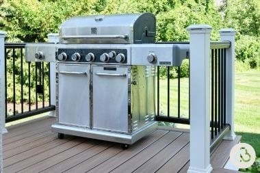 Trex composite deck build in Greater Lansing built by Custom Built Design and Remodeling with grill bump out area