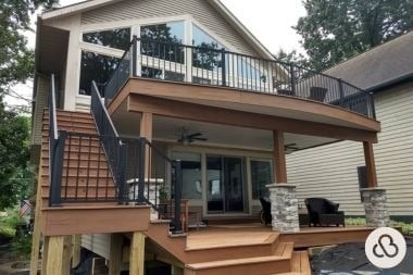 multi level composite deck and patio in Greater Lansing built by Custom Built Design and Remodeling