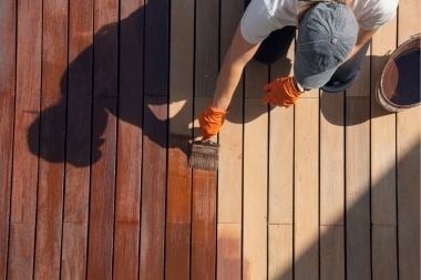 Greater Lansing deck builder staining wood deck