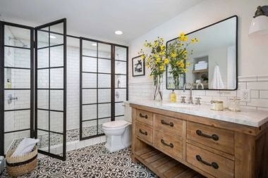 basement bathroom space in Greater Lansing with wet room and large vanity