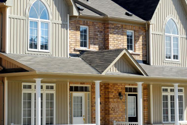 state vs municipality inspectors how each impacts your michigan home remodeling project brick house exterior with large windows custom built mi