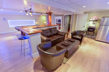 basement lighting ideas for your home remodel led strip lights above sitting area custom built michigan