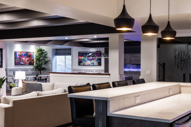 basement lighting ideas for your home remodel smart and pendant lighting above large space with wet bar custom built michigan