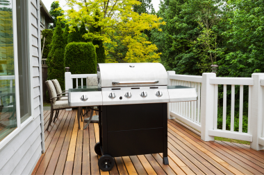 reasons to plan your spring deck build this winter bbq grill area with outdoor dining custom built michigan