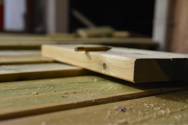 ways demolition impacts deck replacement costs wood decking board on top of build area custom built michigan