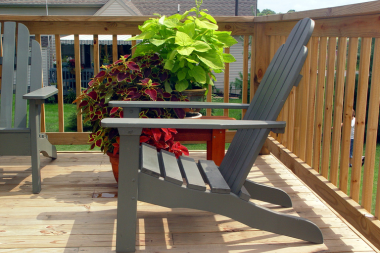 how much does deck railing cost in michigan composite adirondack chairs next to potted plants on decking space custom built mi