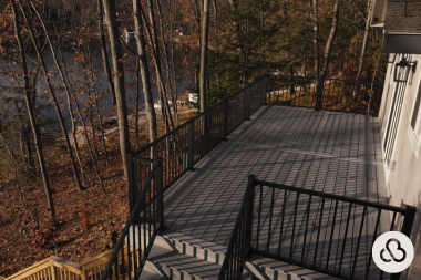 home remodeling trends to expect in 2026 elevated composited deck outdoor living space overlooking water custom built michigan