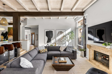 home remodeling trends to expect in 2026 wellness focused living room design with large sectional couch custom built michigan