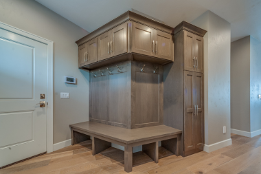 top storage solutions for your home addition mudroom area with coat hooks and lockers custom built michigan
