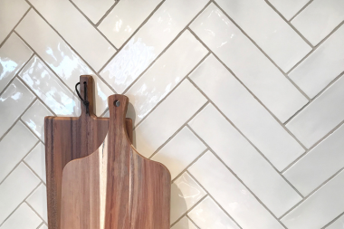 problems with working within allowances during your home remodel herringbone tile kitchen backsplash custom built michigan