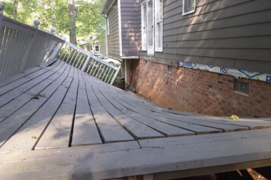 signs that your deck footings arent installed correctly collapsed and crooked decking space custom built michigan