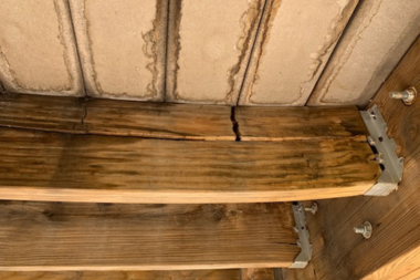 signs that your deck footings arent installed correctly under decking space with sagging joists custom built michigan