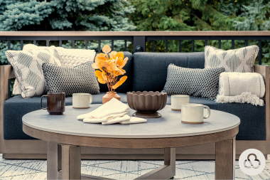 how far in advance should you plan your home remodel composite decking living area with outdoor couch and coffee table custom built michigan