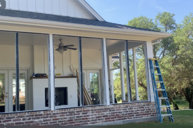 questions to ask before hiring a screened in porch builder covered outdoor living space mid construction custom built michigan