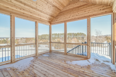 questions to ask before hiring a screened in porch builder covered decking area with snow custom built michigan