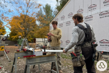 ways to prepare for your deck build project construction remodelers sawing decking boards custom built michigan