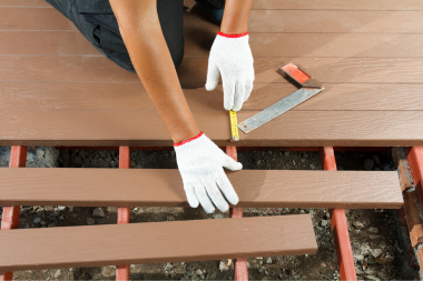 ways to prepare for your deck build project remodeler measuring decking joists custom built michigan