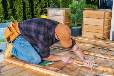 ways to prepare for your deck build project remodeler measuring decking boards custom built michigan