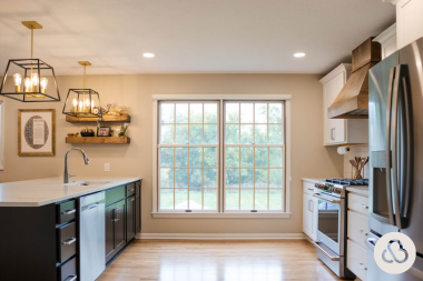 interior design ideas to revitalize your home this spring kitchen remodeling project with large window and decorative range hood custom built michigan