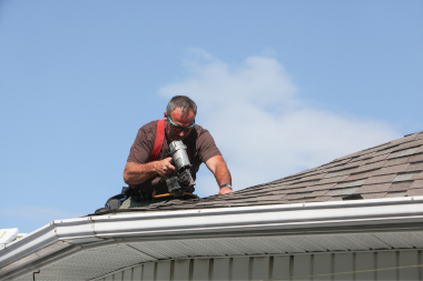 questions to ask your michigan roofing contractor before hiring them roof remodeler nailing shingles custom built mi