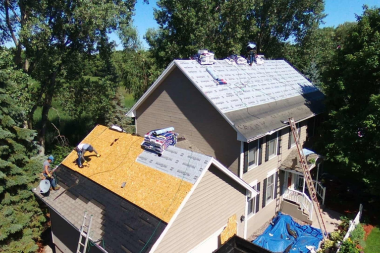 questions to ask your michigan roofing contractor before hiring them ongoing roof replacement project custom built mi