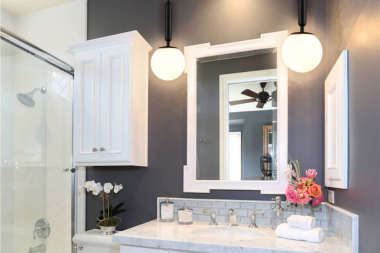 tips for better bathroom lighting design pendant light fixtures above vanity custom built michigan