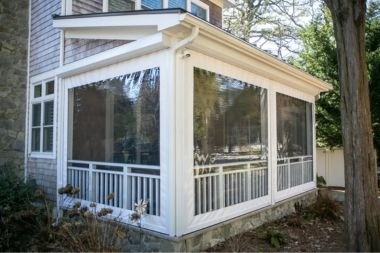 retractable screen patio enclosure sunroom addition in Greater Lansing