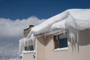 Greater Lansing home with ice dam on roofing