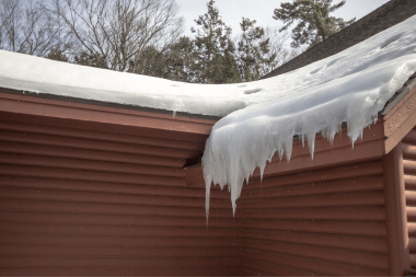 winter Greater Lansing home with icicles