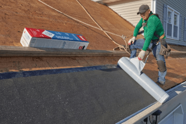 roofing contractor in Greater Lansing installing ice and water shield