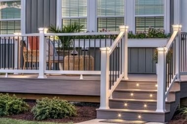 composite deck with trex riser and post cap lights in Greater Lansing