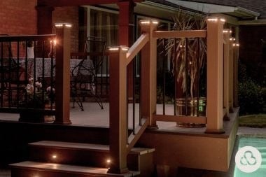 composite deck project with post cap lights in Greater Lansing built by Custom Built Design and Remodeling