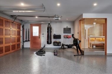 home gym in garage addition with sauna Greater Lansing Michigan