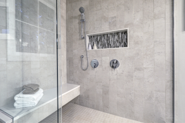 Greater Lansing luxury bathroom remodel with wet room and custom shower niche