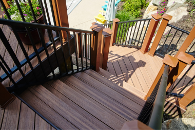 Greater Lansing composite deck with stairs and handrails