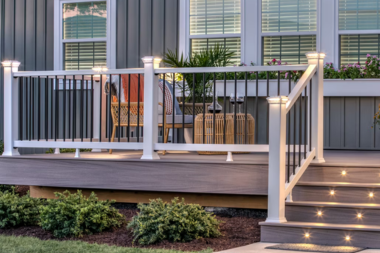 Greater Lansing composite deck with trex outdoor lighting and risers