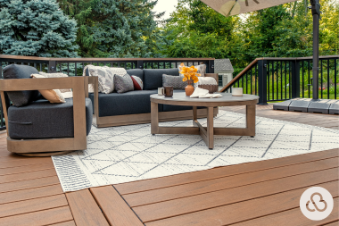 Greater Lansing composite deck project built by Custom Built Design and Remodeling with trex furniture and railings