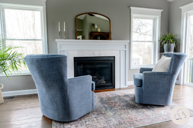 four seasons room addition in Greater Lansing Michigan with fireplace and hardwood flooring