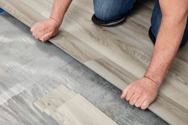 luxury vinyl tile plank installation for basement finish remodeling project custom built michigan