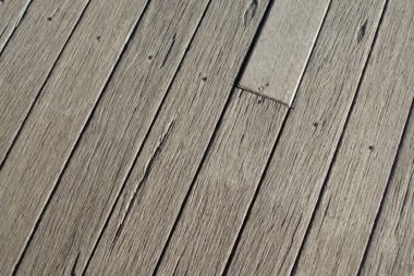uneven wood decking boards in Greater Lansing