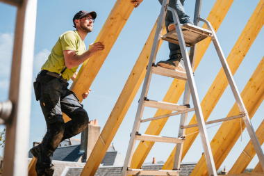 Greater Lansing home remodeling contractors installing roofing