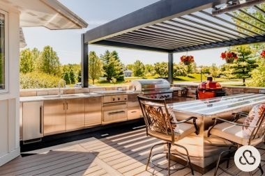 composite deck with outdoor kitchen and pergola in Greater Lansing Michigan built by Custom Built Design and Remodeling