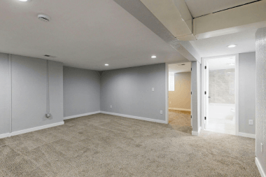 Greater Lansing basement finishing project with new carpet flooring
