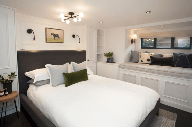 Greater Lansing basement bedroom project with built in reading nook