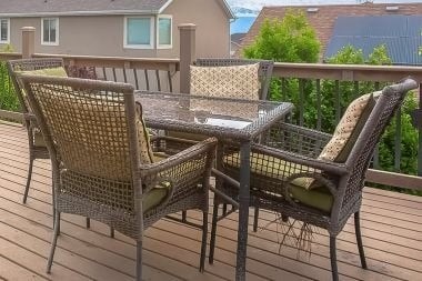 wood deck outdoor living space with dining table in Greater Lansing Michigan