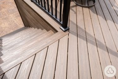 composite deck project in Grand Ledge Michigan built by Custom Built Design and Remodeling with stairs and railings