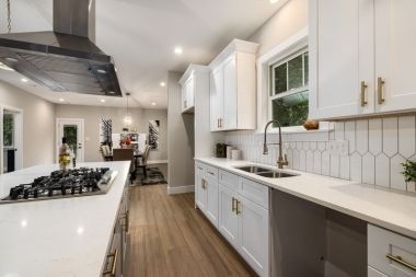Greater Lansing luxury kitchen remodeling project with unique tile backsplash