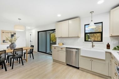 Greater Lansing kitchen remodeling project with open concept layout and dining area